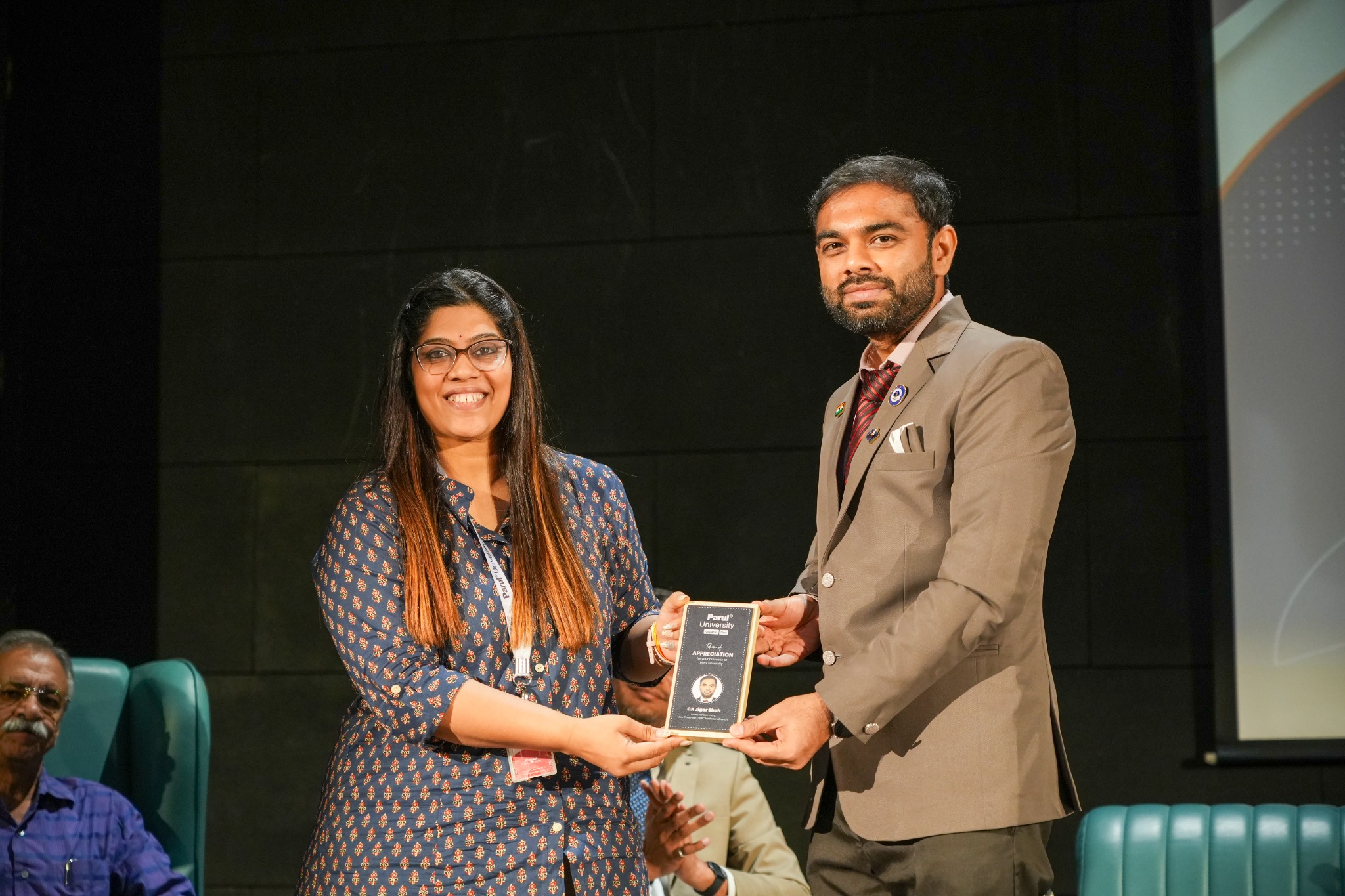 CA. Jigar Shah receiving a token of appreciation at Parul University
